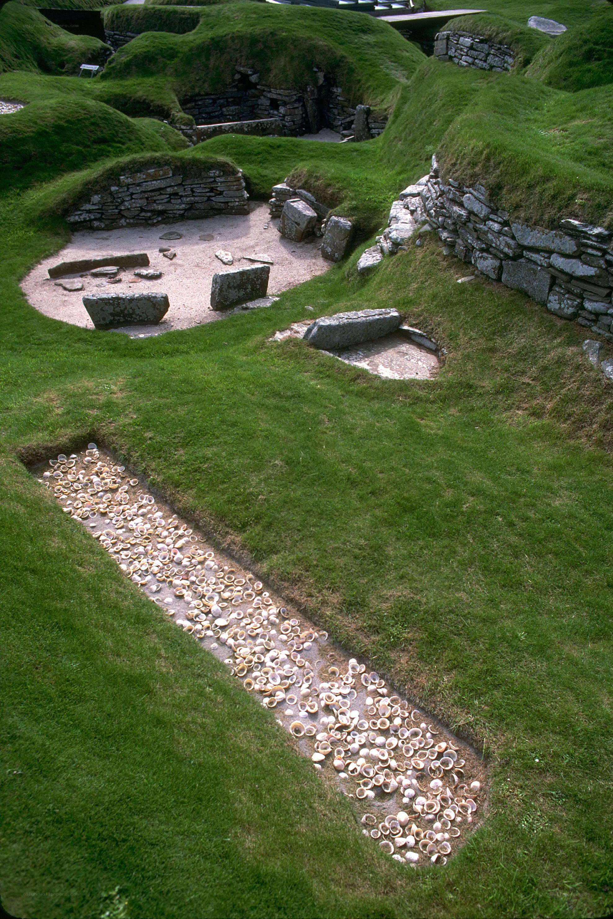 ancient stone ruins with pottery
