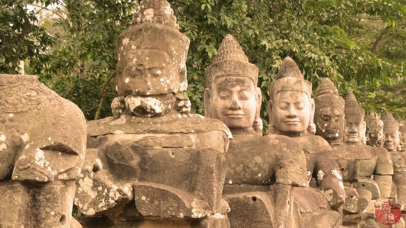ancient stone statues in a temple