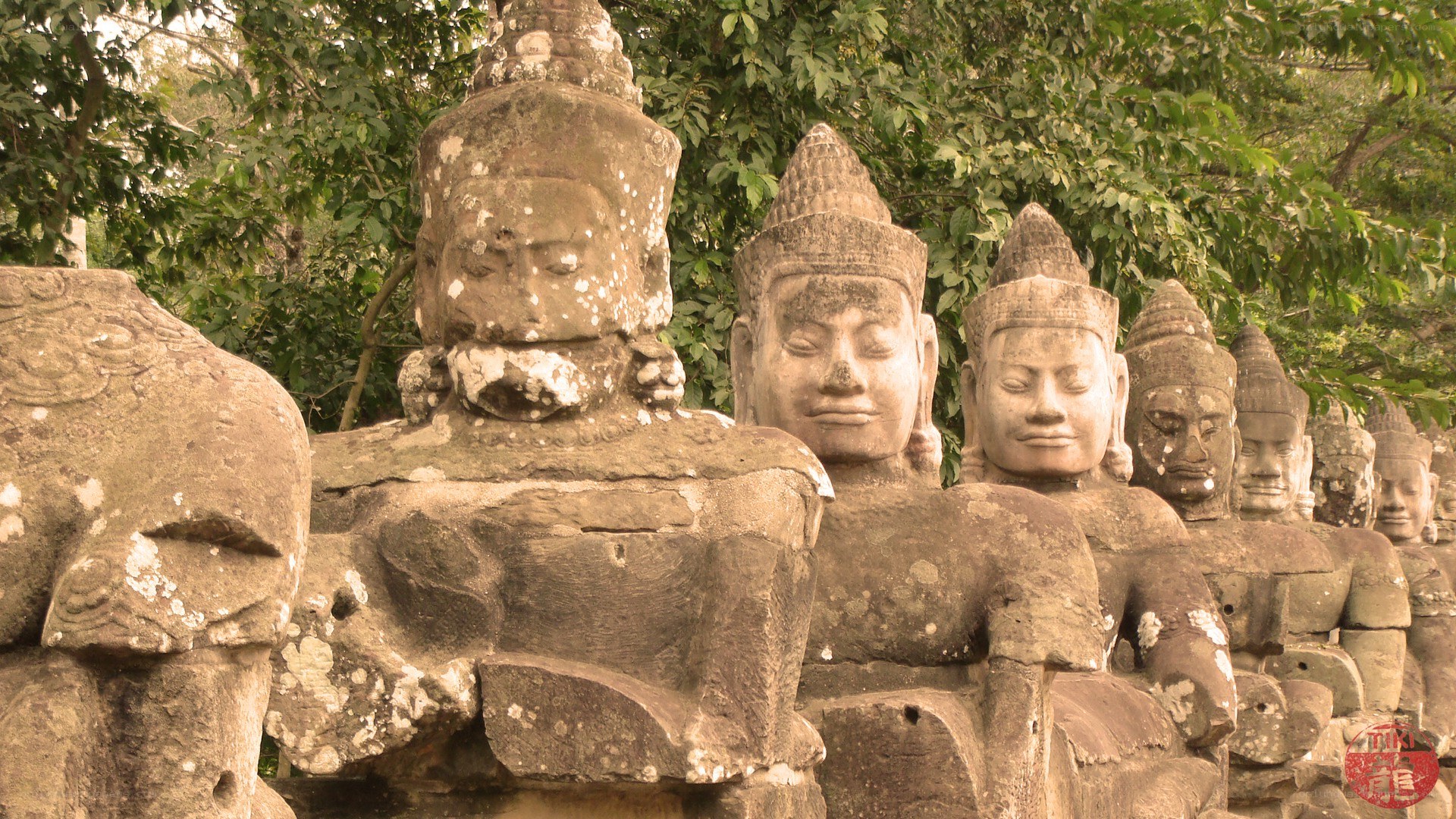 ancient stone statues in a temple