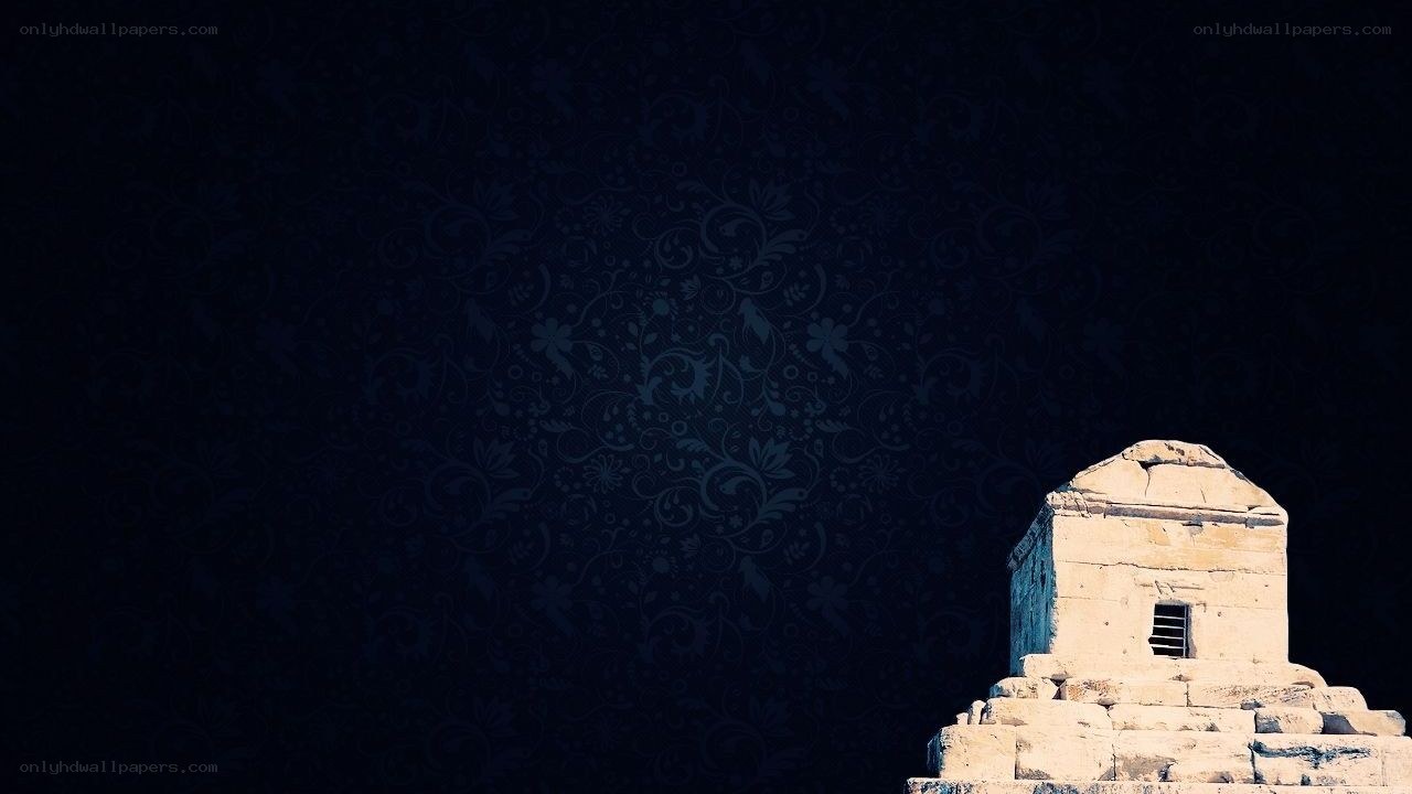 ancient stone structure at night