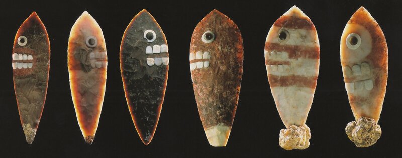 ancient stone tools with faces