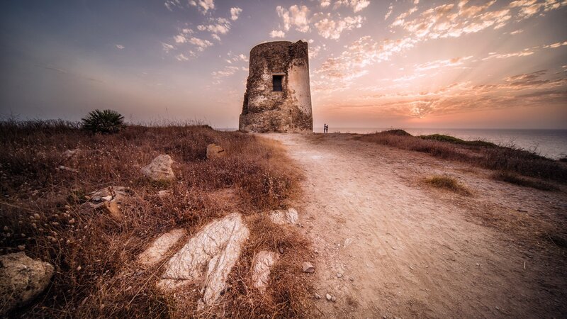 Ancient Stone Tower — Brown, Serene, Sunset