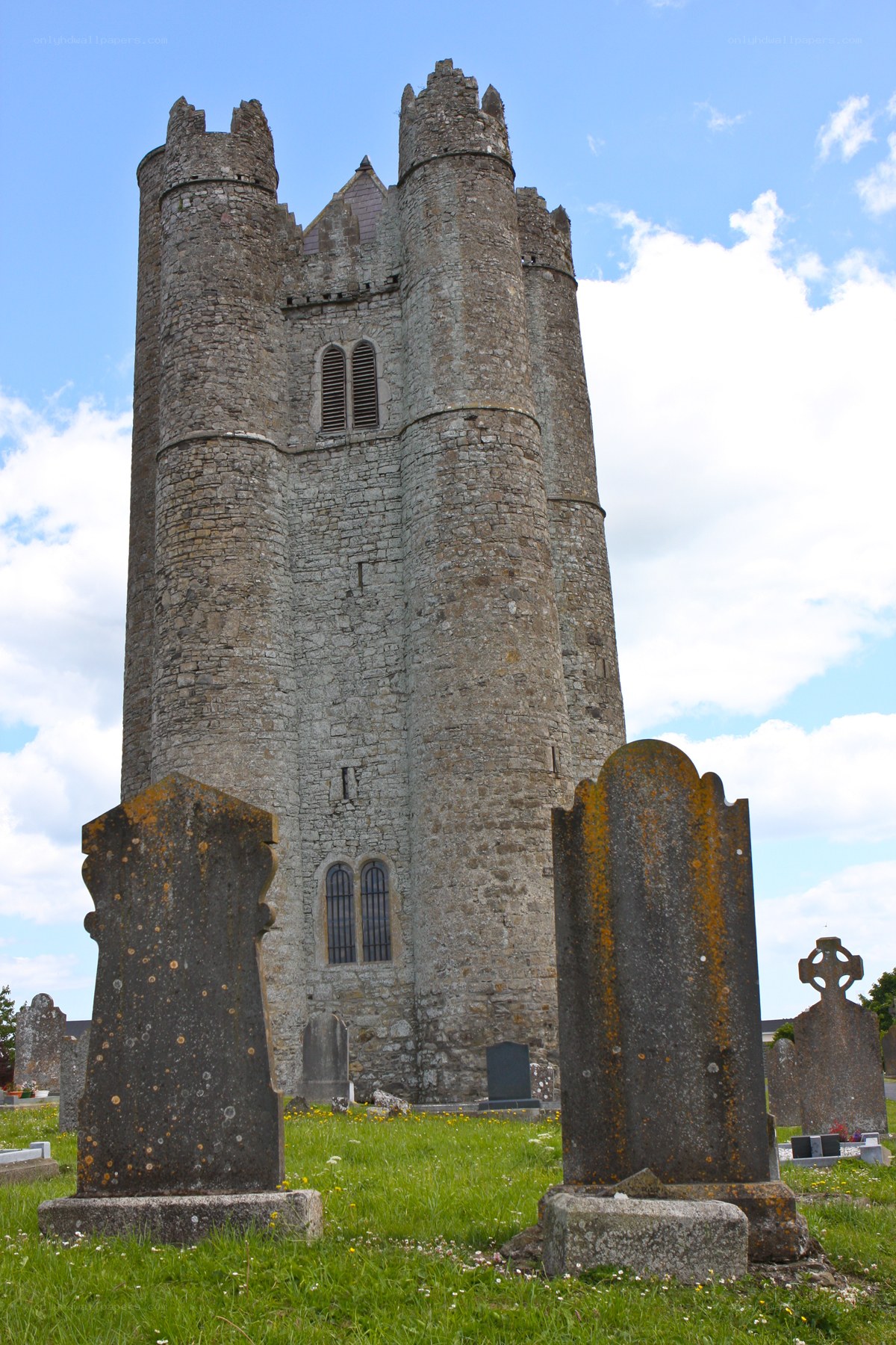 ancient stone tower in cemetery