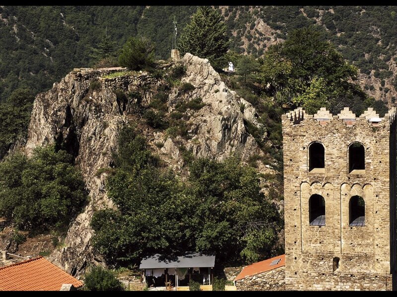 ancient stone tower on a hillside