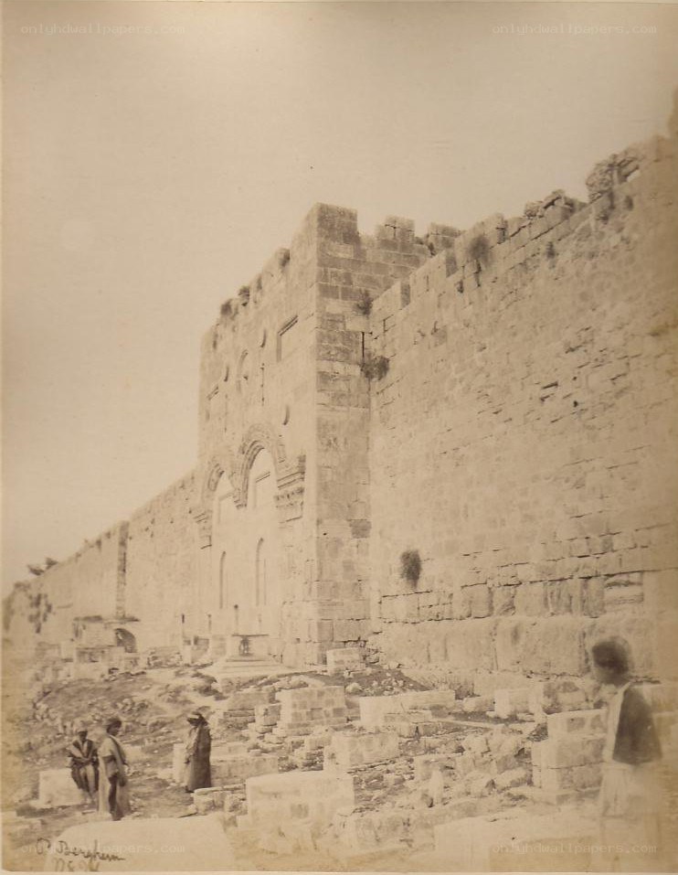 ancient stone wall with archway