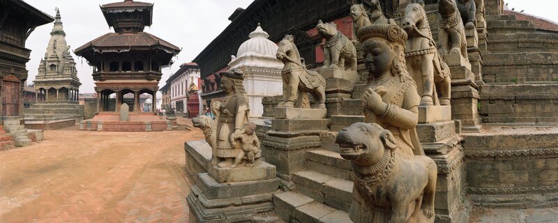 ancient temple courtyard with statues