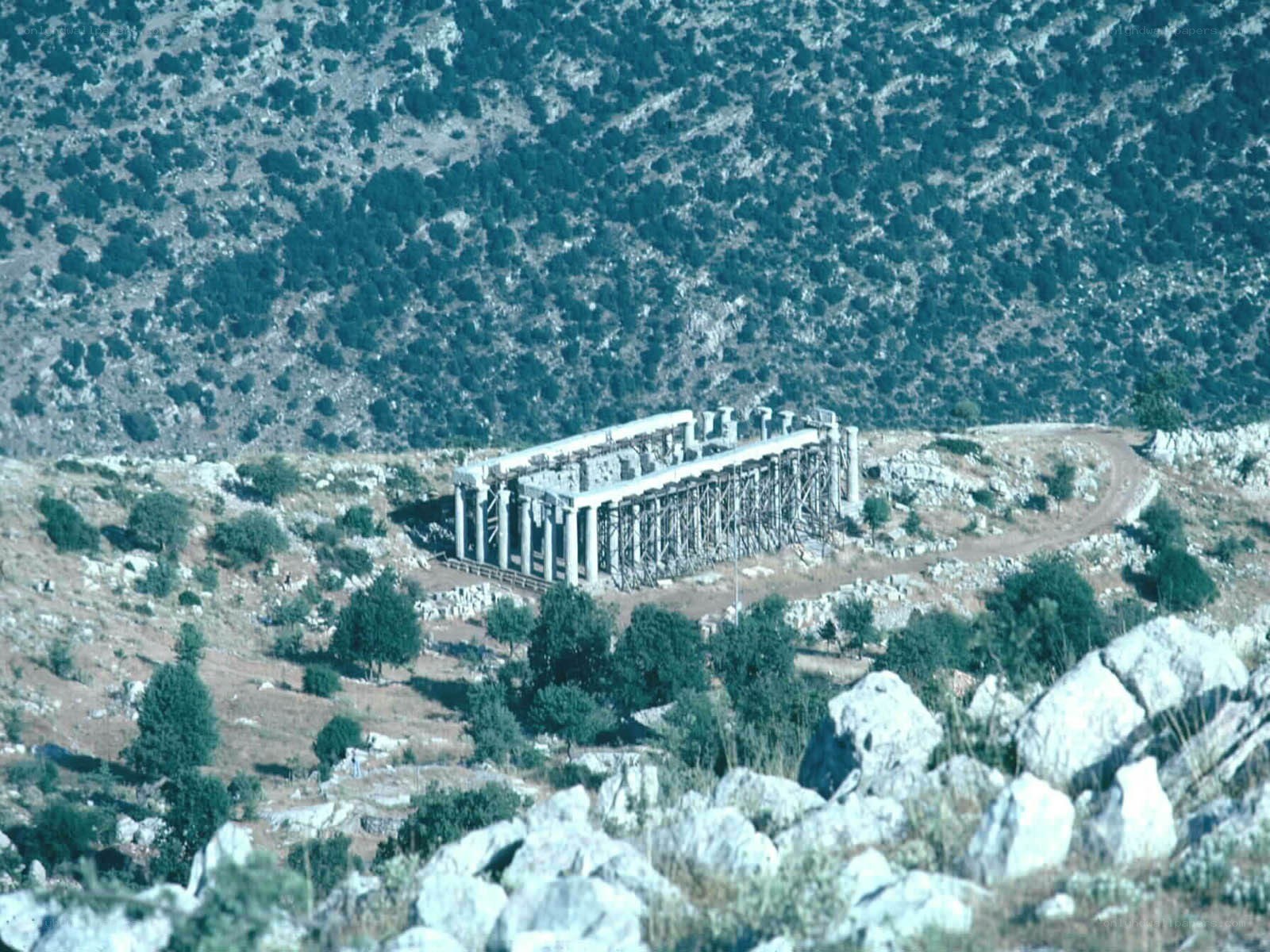 Ancient temple ruins on a hillside
