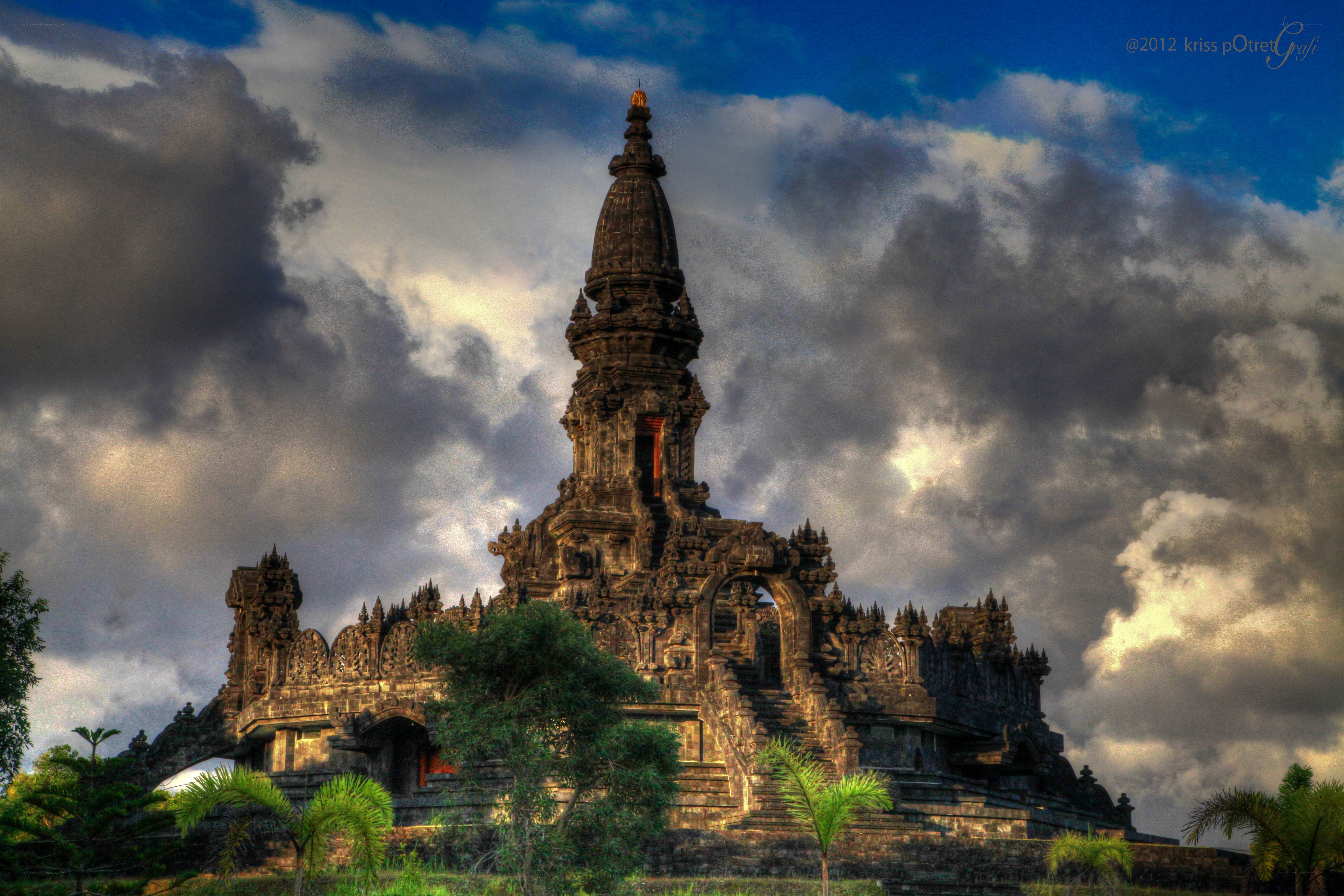 ancient temple under dramatic sky