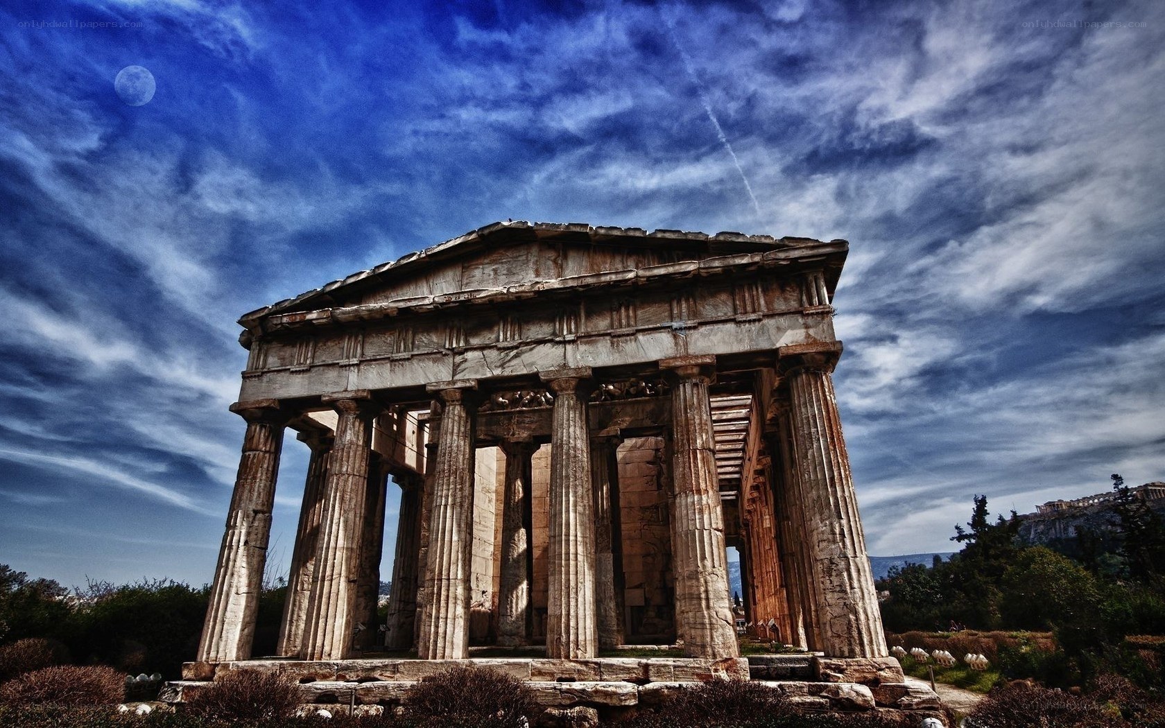 Ancient temple under dramatic sky