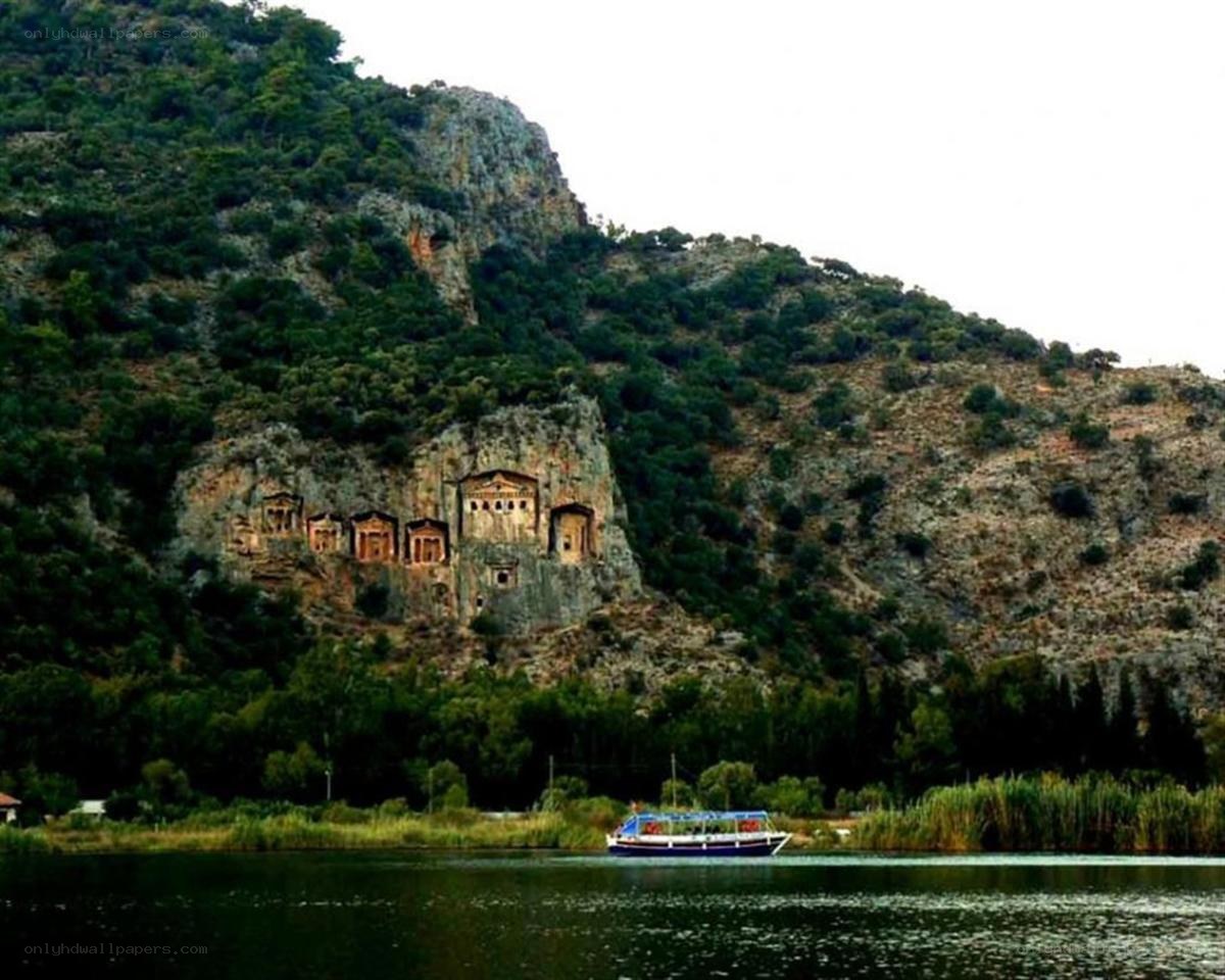 ancient tombs carved into cliff