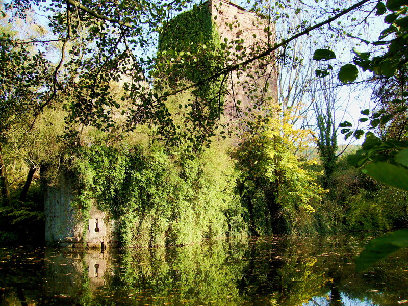 Ancient tower by a river