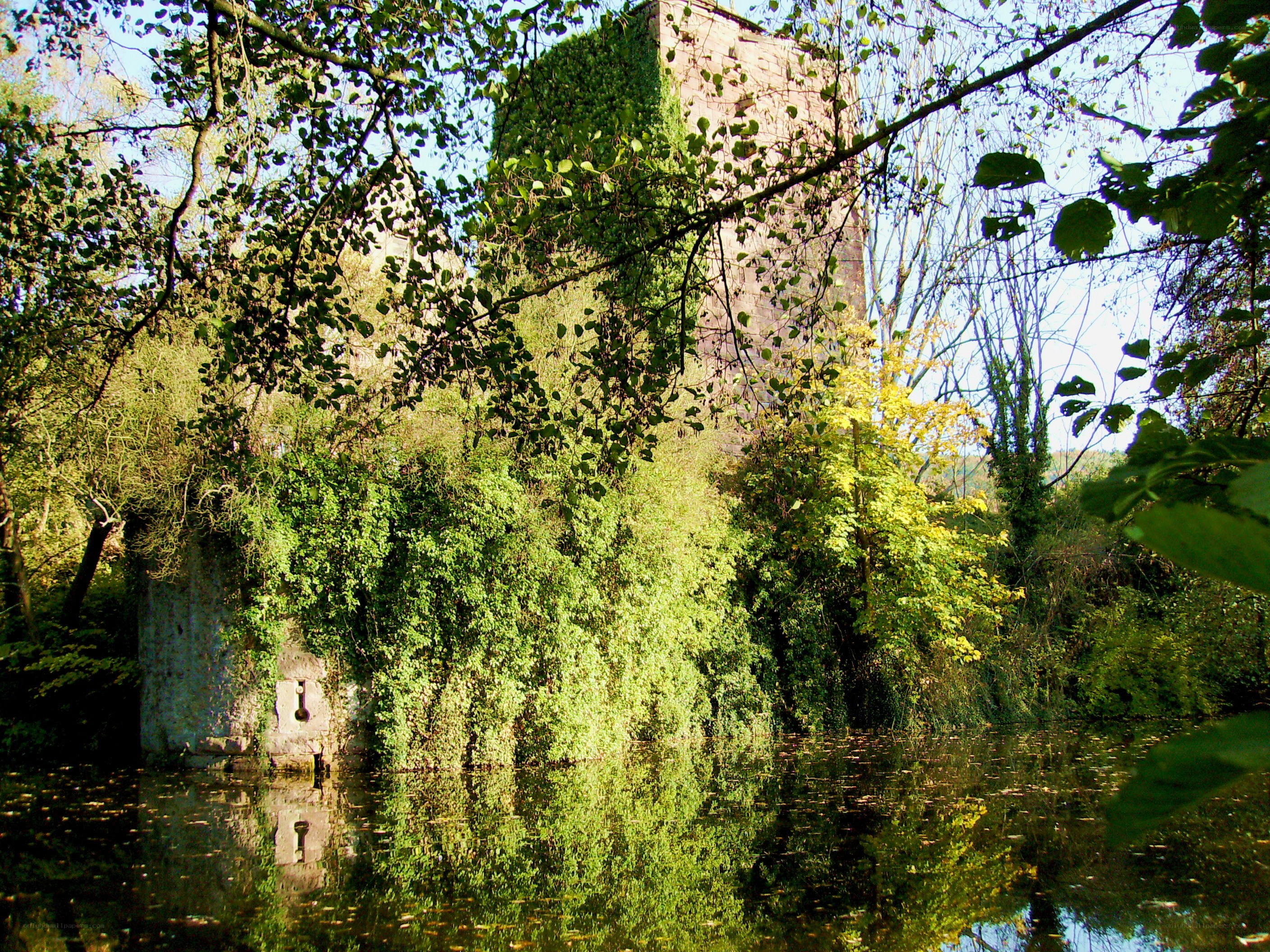 Ancient tower by a river
