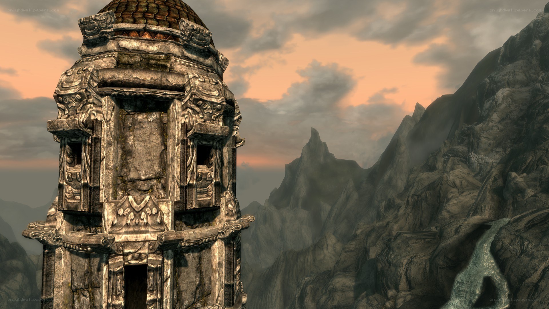 ancient tower in mountainous landscape