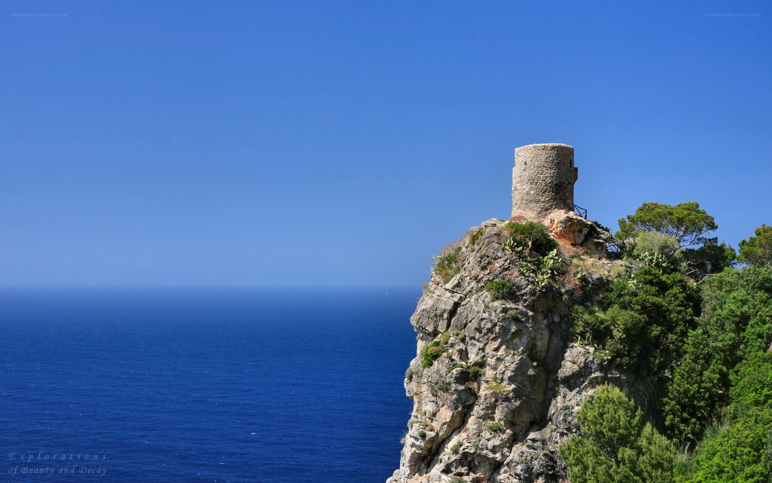 ancient tower on coastal cliff