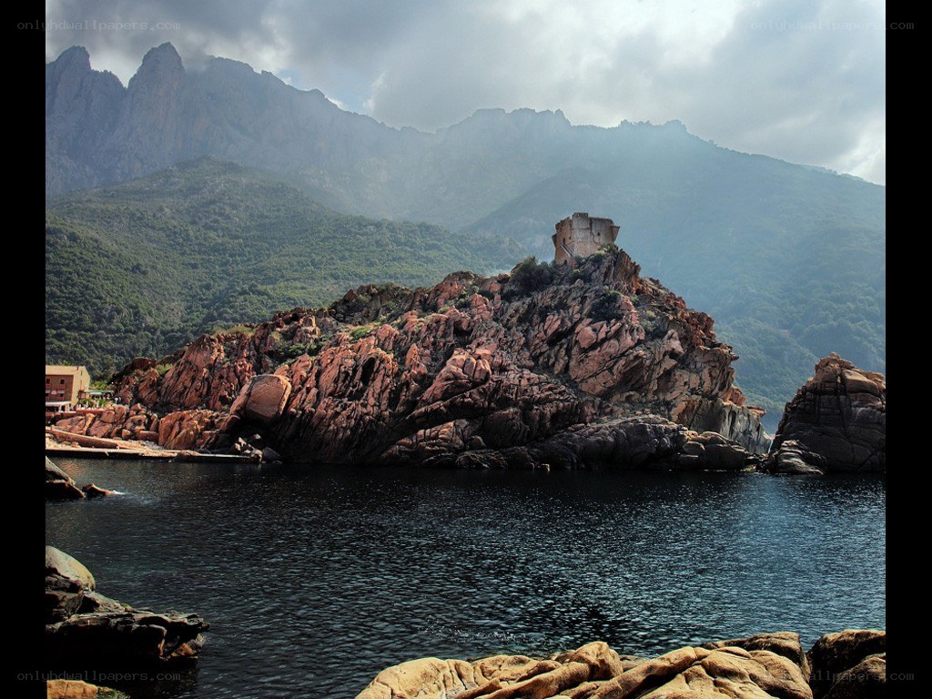ancient tower on rocky island