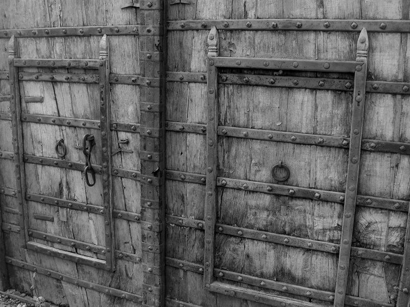 ancient wooden doors with iron bands