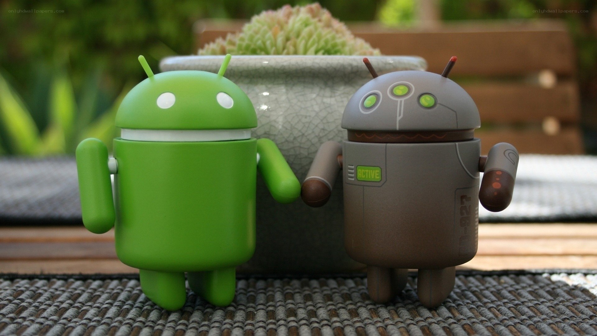 Android figurines on table