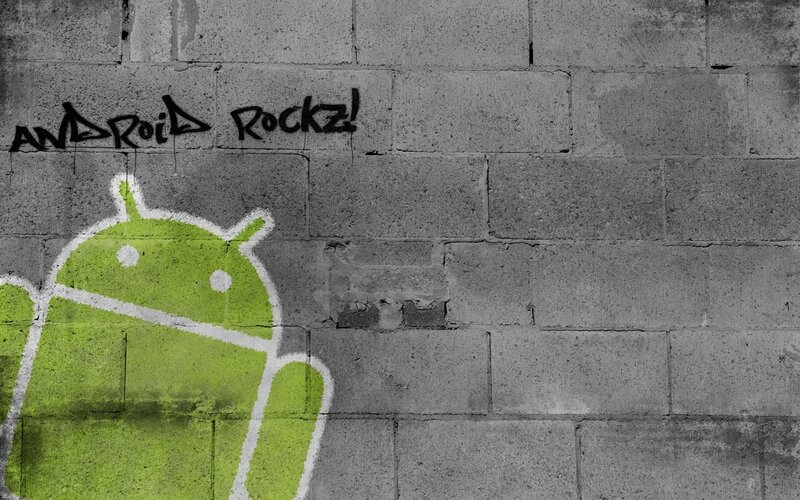 Android graffiti on brick wall