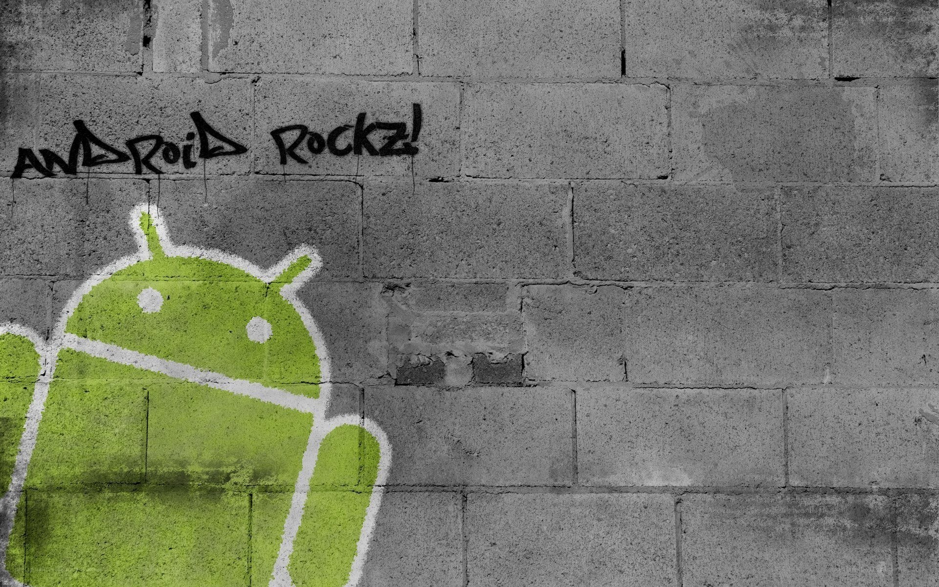 Android graffiti on brick wall