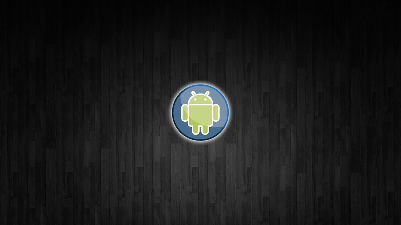 Android logo on dark wood