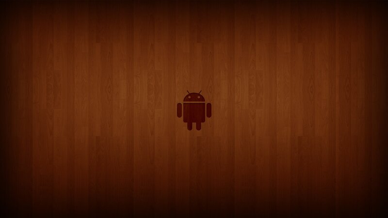 Android logo on wood background