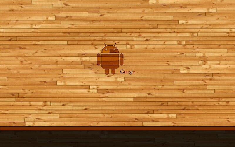 Android logo on wood background