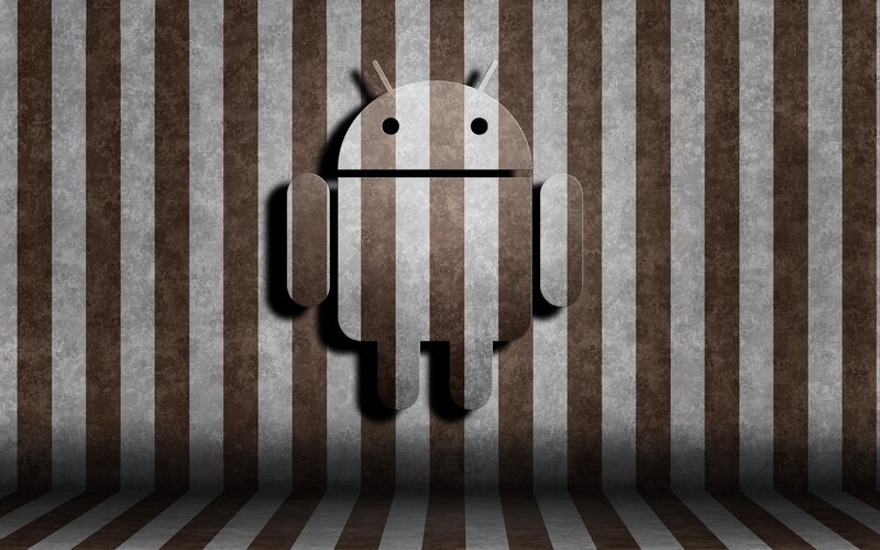Android robot on striped wall