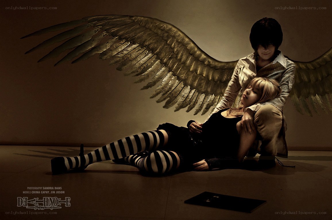 angel and fallen figure
