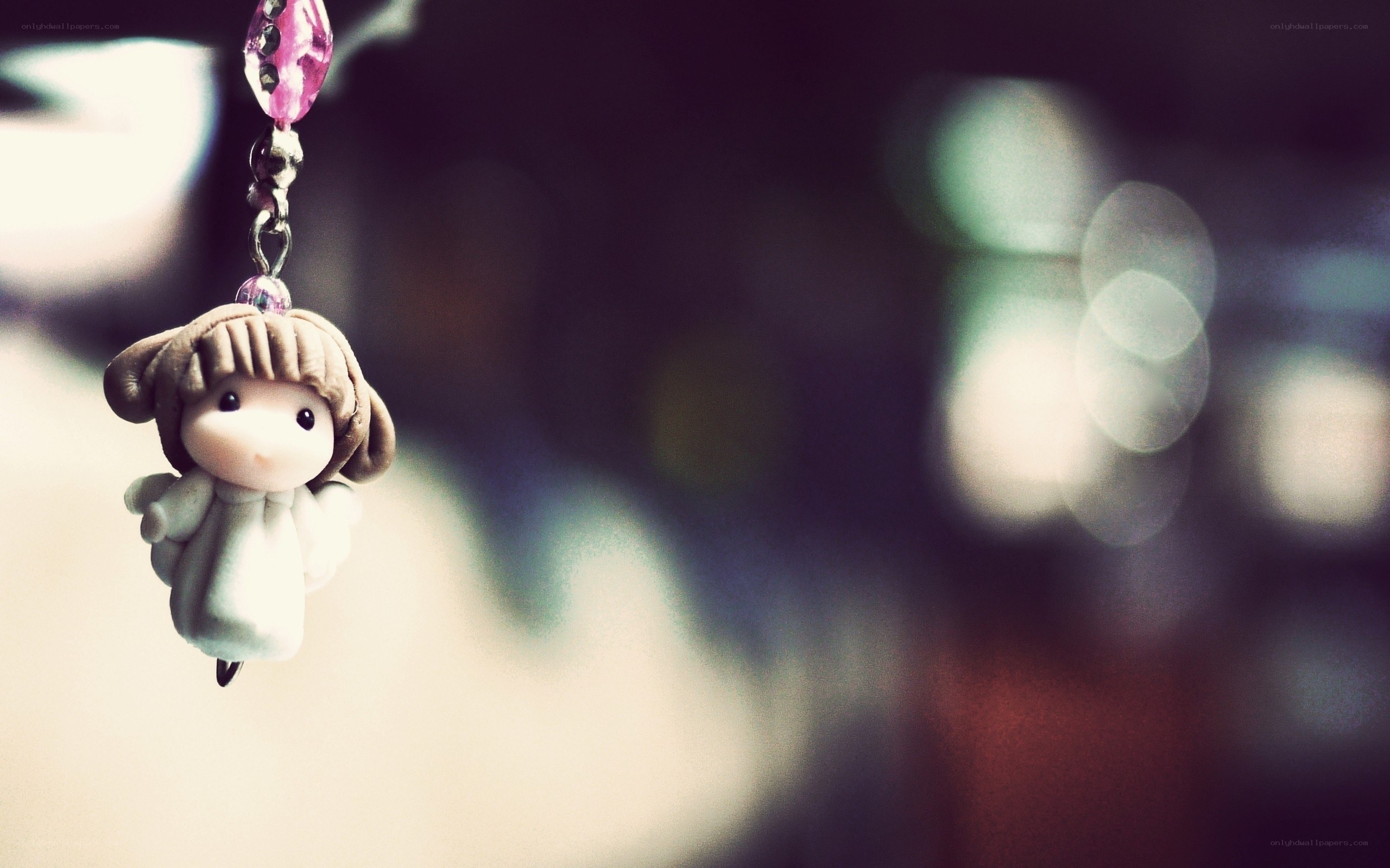 Angel charm with pink bead