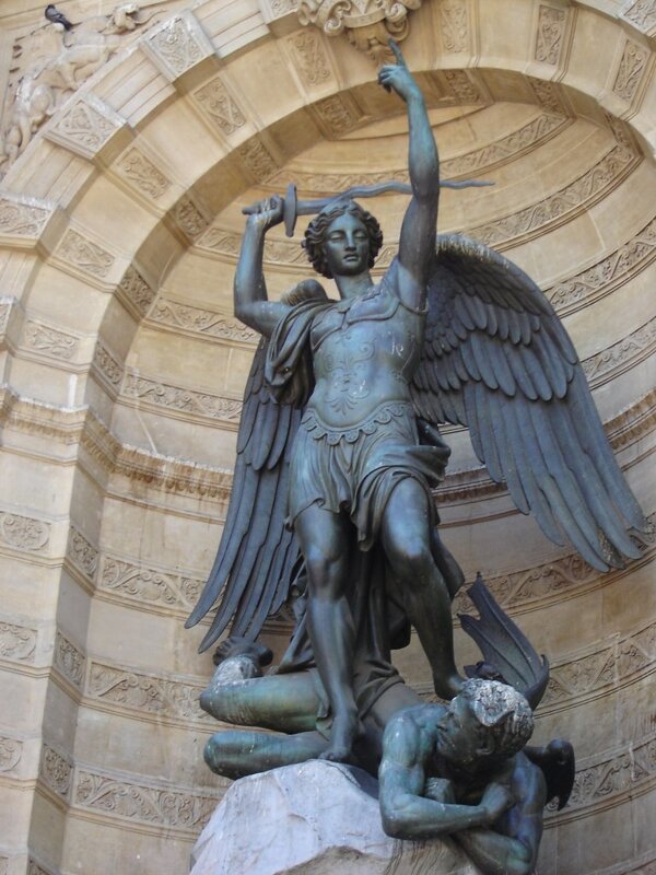 Angel defeating the devil statue