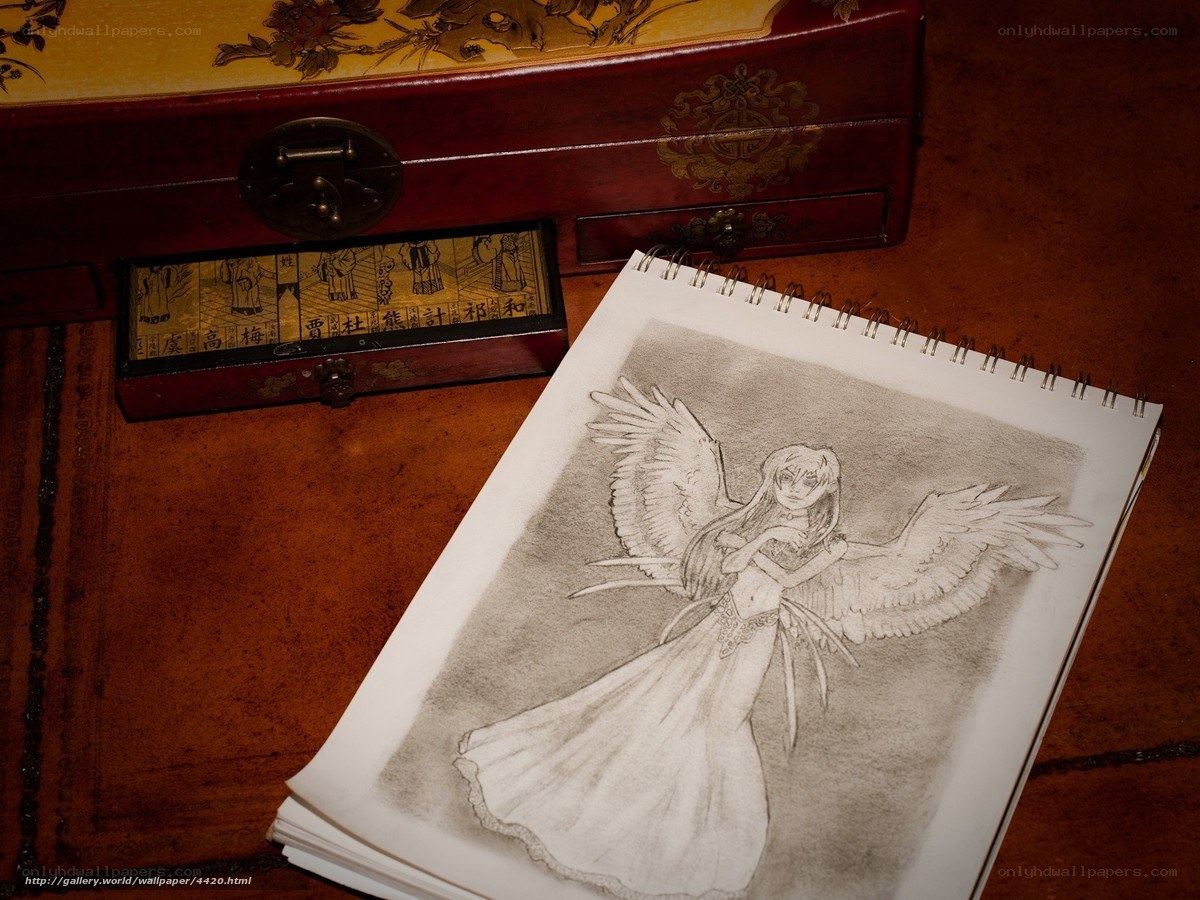 Angel drawing on sketchbook