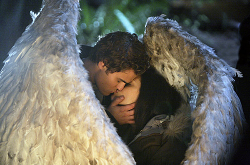 Angel Embracing Woman — White, Dramatic