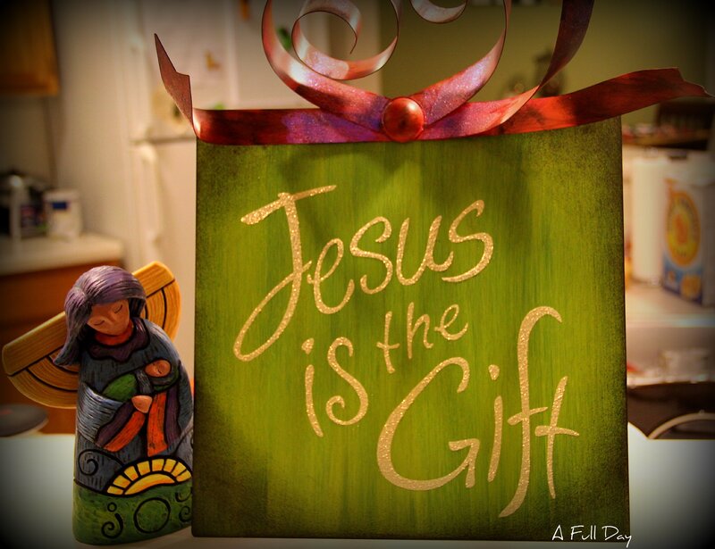 Angel Figurine and Sign