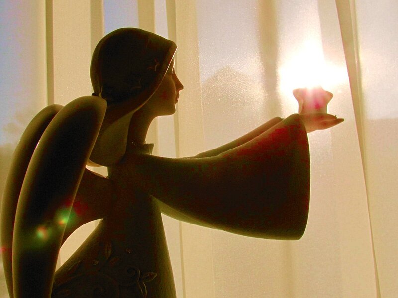Angel Figurine Holding Candle