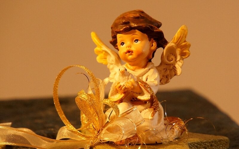 Angel Figurine Holding Dove