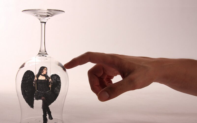 Angel Figurine in Wine Glass