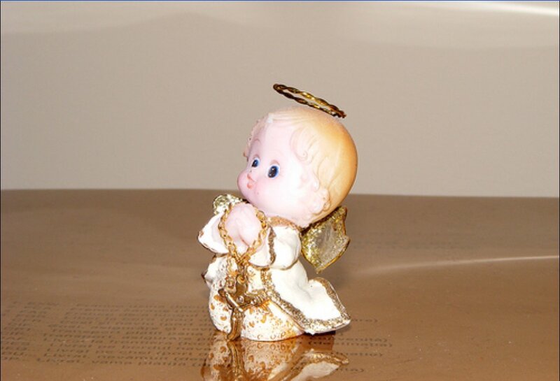 Angel Figurine on Book