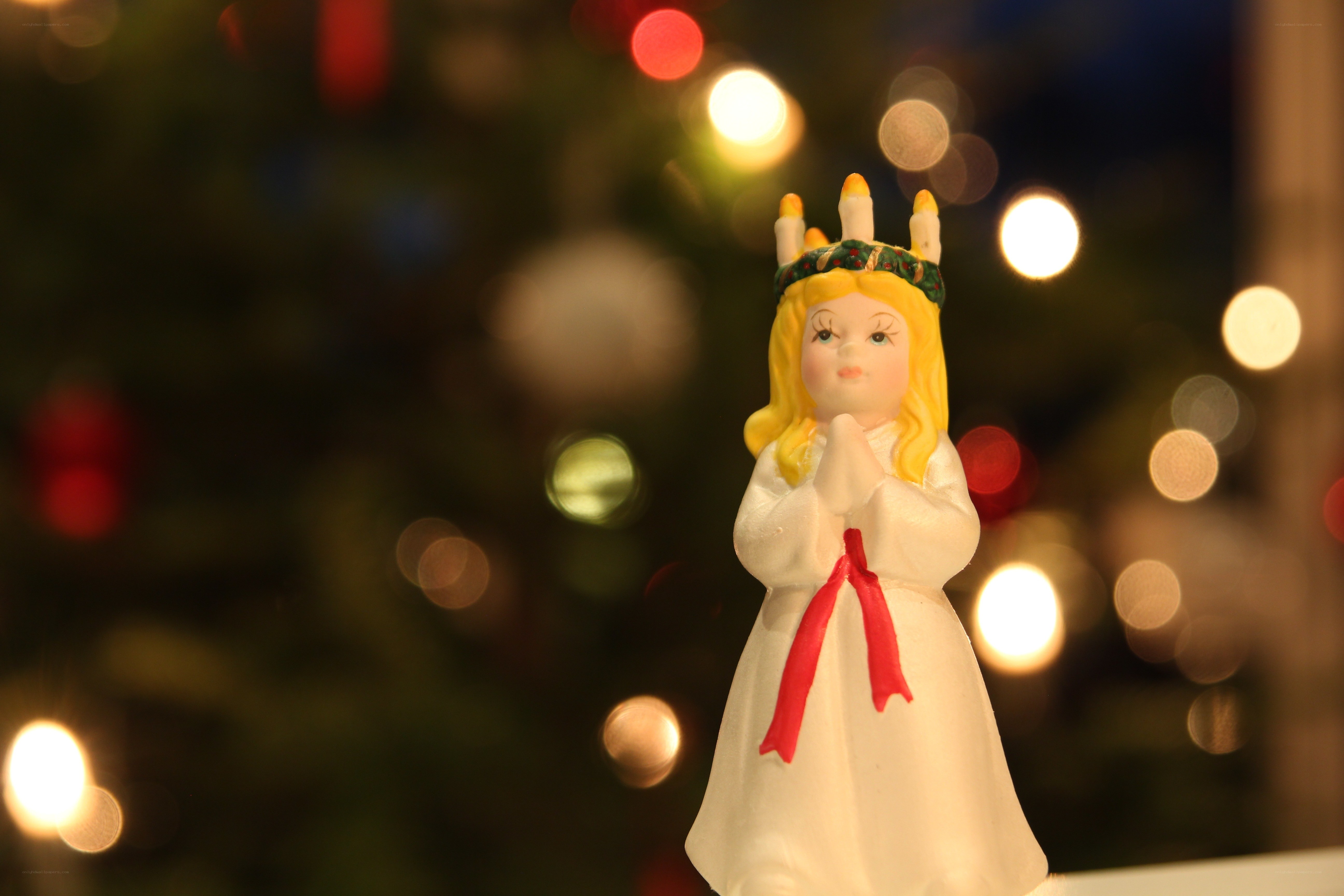 Angel figurine with candles