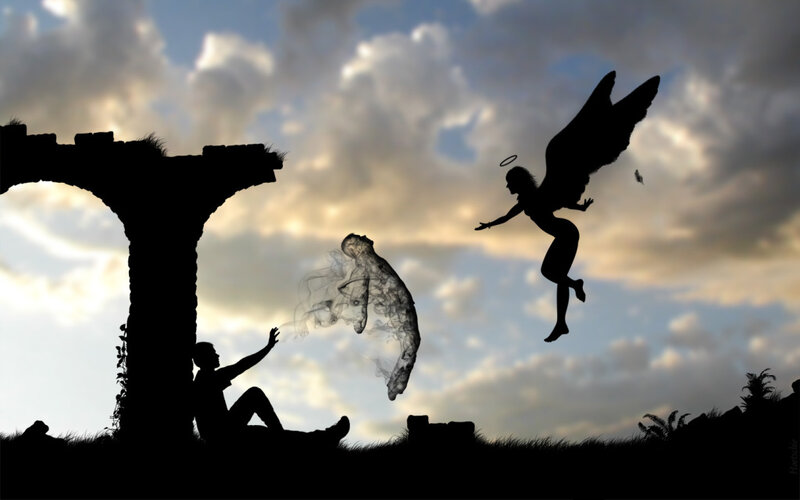 Angel guiding soul to heaven