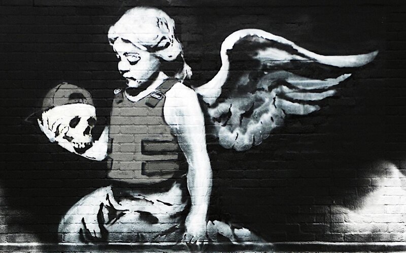 Angel Holding Skull