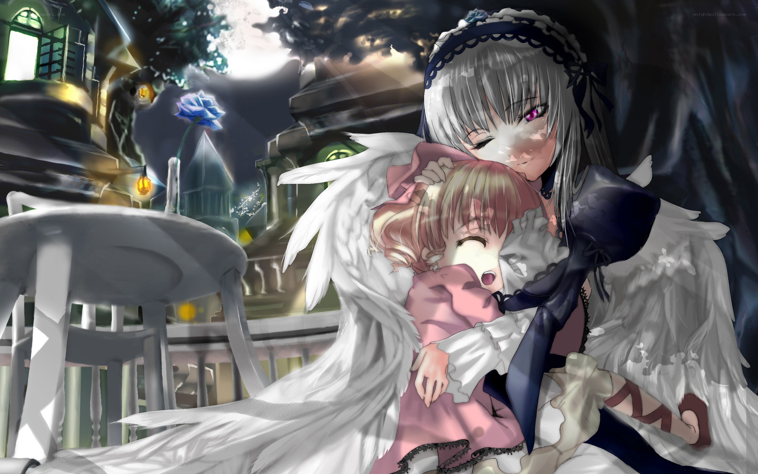 Angel hugging a child at night