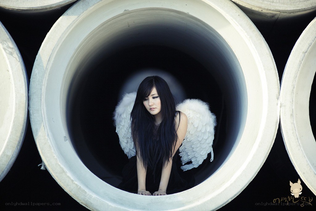 angel in a pipe tunnel