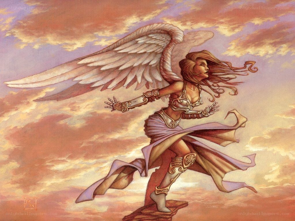 Angel in flight at sunset