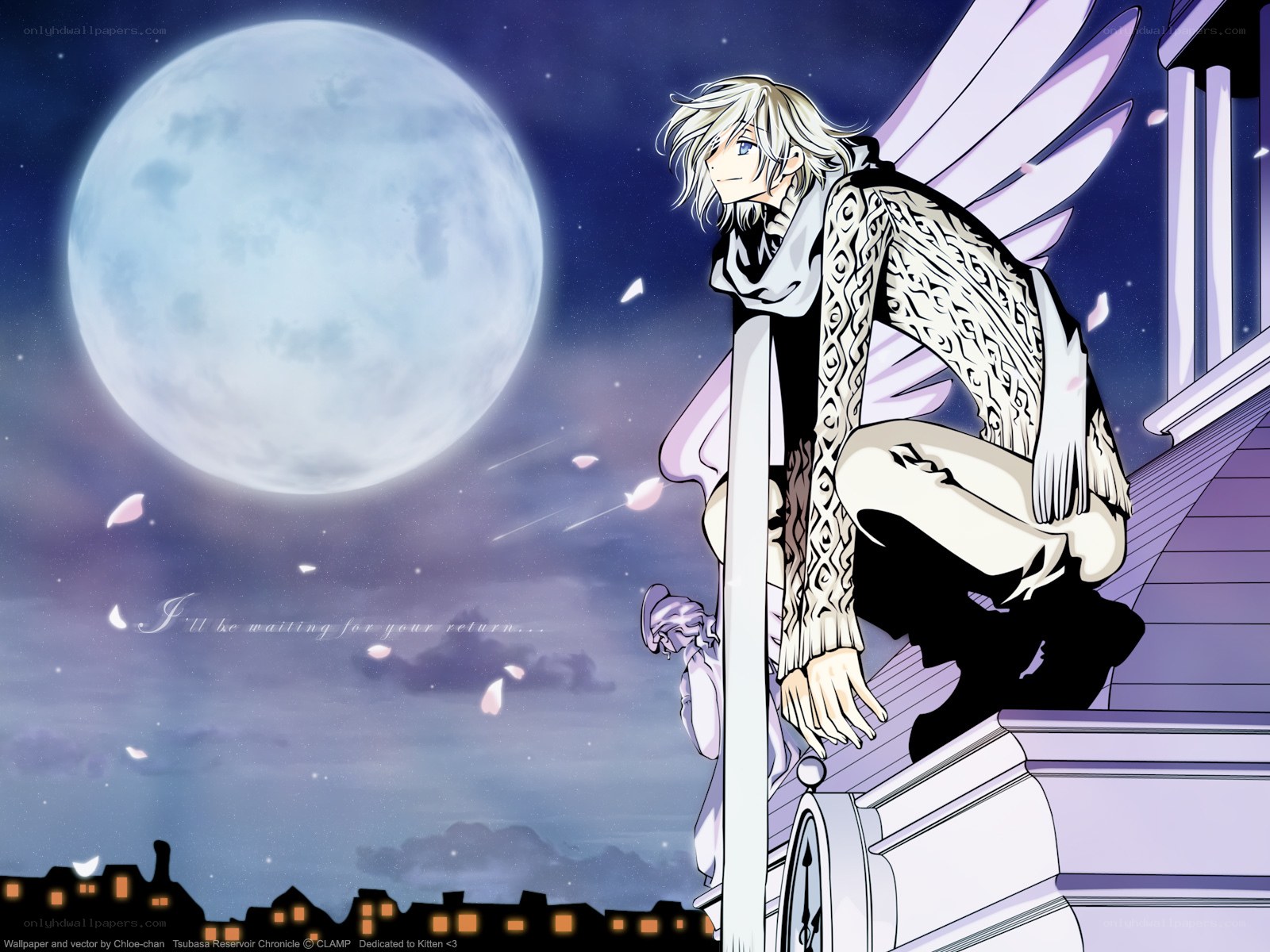Angel on a balcony at night