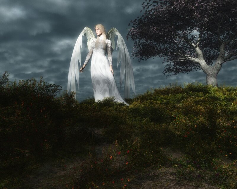 Angel on a hill at dusk