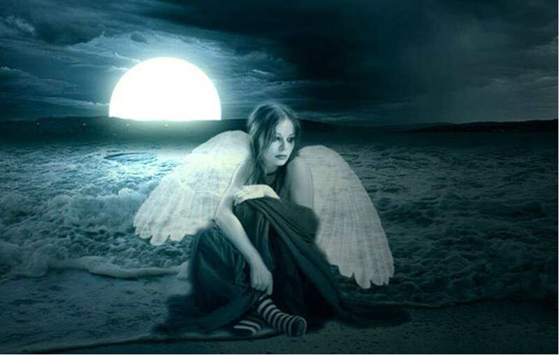 angel on a moonlit beach