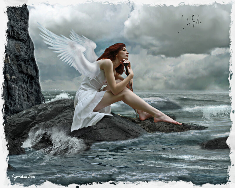 Angel on a rocky shore
