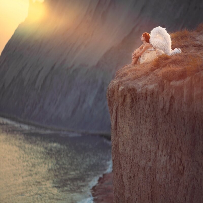 Angel on Cliff Edge — Brown, Serene