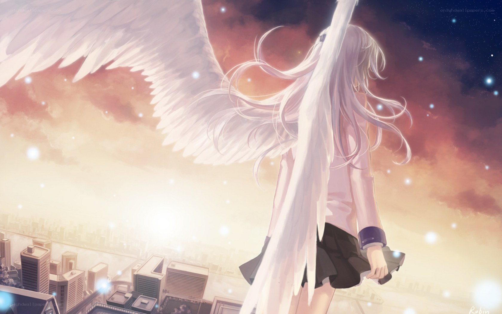 angel overlooking city at sunset