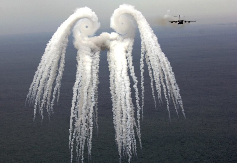 Angel-shaped smoke trails from aircraft